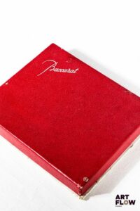 BACCARAT. Suite de 10 portes couteaux en cristal. Dans leur boîte cartonnée d'origine. Bon état général malgré quelques légers défauts (petits éclats).