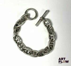 Dans le goût d'HERMES Bracelet en argent 925, d'après le modèle chaine d'encre Poinçon Minerve Longueur : 22 cm Poids : 61,27 g