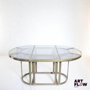 Dans le style de Gabriella Crespi, Table de salle à manger dans l'esprit du modèle "Puzzle". Années 1970. 72 x 164 x 110. L'une des plaques de verre remplacée. Expédition sur devis