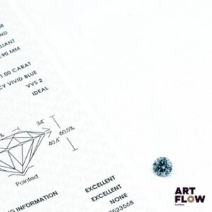Diamant de synthèse (lab-grown diamond) de forme ronde 1 carats, accompagné d'un certificat de laboratoire (IGI) indiquant : FANCY, VVS2