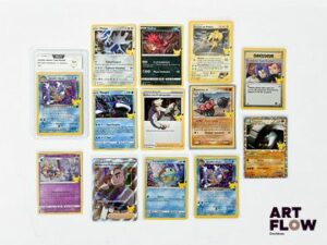 Ensemble de 13 cartes Pokémon - Collection 25 ans Célébrations. Contient notamment le Léviator Obscur 8/82 holographique PCA 9,5 (Neuf). Cartes en état Near-Mint / Mint, en français.