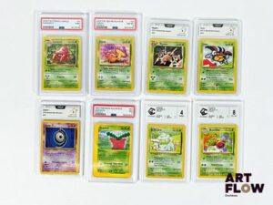 Ensemble de 8 cartes Pokémon gradées du bloc Wizards communes et peu communes : - Granivol 83/147 - Aquapolis - PSA 7 (Proche du Neuf). - Zarbi D 47/75 - Neo Discovery - PCA 9 (Proche du Neuf). - Migalos 27/111 - Neo Genesis - PCA 9 (Proche du Neuf). - Coxy 63/111 - Neo Genesis - PCA 9 (Proche du Neuf). - Paras 47/64 - Neo Révélation - PSA 8 (Proche du Neuf / Neuf). - Parasect 41/64 - Jungle - PSA 9 (Neuf). - Boustiflor 48/64 - Jungle - CCC 8 (Excellent / Proche du Neuf). - Bulbizarre 44/102 - Set de Base - CCC 4 (Correct). En français.