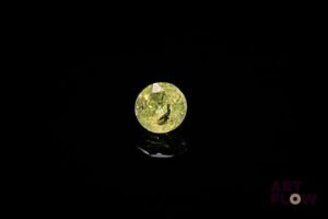 Grenat grossulaire rond. Inclusions. 1.36 ct. 6.3mm