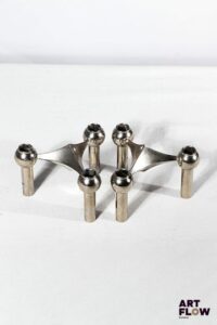 Hans NAGEL (1926-1978) & Werner STOFF (XXe) Modèle S22 Paire de bougeoirs en métal argenté. Haut : 6 cm. Petites rayures d'usage.