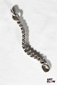 HERMES Bracelet en argent 1er titre 925 Modèle torsade Fermoir à clapet Signé HERMÈS L.18 cm Poids : 88,34 g
