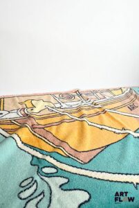 HERMÈS Serviette de bain en éponge. L. 140 cm Quelques usures