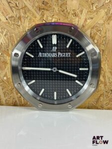 Horloge concessionnaire Audemars Piguet. Fonctionnelle - Etat général excellent Diamètre : 33 cm