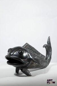 JEAN MARAIS Sculpture poisson en terre cuite à glaçure noire. Signé. L. 43 cm H. 21 cm Très bon état général malgré quelques très légers défauts.