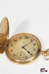 LIP Montre de gousset en or 750/°° , cadran à chemin de fer, chiffres romains. Double cuvette numérotée. Dans son écrin Aubertin, Lyon Poids brut : 67,60 grammes