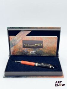 MONTBLANC. Meisterstuck. Modèle Ernest Hemingway. Stylo bille en résine noire et corail. Modèle créé en 1992. Édition limitée à 30 000 exemplaires Dans son écrin d'origine figurant un livre relié. Avec papiers, son livret et sa sur boîte. Longueur : 12,5 cm environ Bon état général malgré quelques très légers défauts.