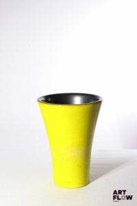 POL CHAMBOST (1906-1983) Vase rouleau à col évasé en faience émaillée, l'extérieur à couverte jaune (bullée), l'intérieur à couverte noire. Incisé sur l'envers "Poterie Pol Chambost, numéro illisible, Made in France" 25 x 19 cm Petit saut d'émail sur la base Bibliographie : Philippe Chambost, "Pol Chambost, Sculpteur-Céramiste 1906-1983", Somogy Editions d'Art, Paris, 2006, modèle similaire p. 115