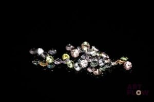 Quarante saphirs multicolores . 2.19 cts. Dims. moy.: 2.2mm x 3.0mm