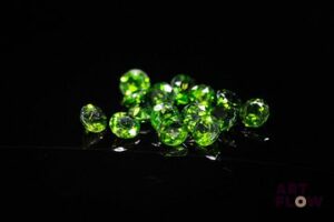 Quinze diopsides chromées rondes. Non chauffée. 4.20 cts. Diam. moy.: 3.9mm