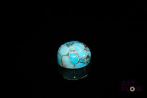 Turquoise «copper» cabochon rond. Traité. 4.45 cts. 10.5mm