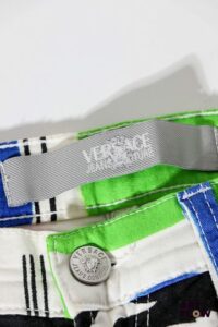 VERSACE Jeans Couture Jean droit en toile à motifs multicolores. Taille 31/45. Excellent état général