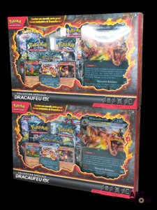 Ensemble de deux coffrets Pokémon scellés : Collection Spéciale Dracaufeu Ex Série du bloc Écarlate & Violet En français Neufs : quelques légers défauts notamment une déchirure sur le devant d'un des coffrets (voir photos)