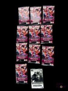 Ensemble One Piece comprenant 10 boosters de la série Des poings vifs comme l'éclair OP-11 et 1 booster Pack du 1er Anniversaire Neuf Scellés En Français