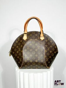 LOUIS VUITTON Modèle Ellipse Circa 2005 Sac à main en toile monogrammée et cuir naturel Dimensions : 30 x 40 x 15 cm Petites usures et patine notamment sur les anses du sac (voir photos)