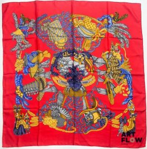HERMÈS Paris Modèle "Chapeau !" d'après un dessin d'Annie Faivre Carré en twill de soie dans les tons rouges Dimensions : 90 x 90 cm Très bon état général malgré quelques infimes taches Dans ses plis d'origine