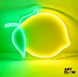 Enseigne lumineuse plexiglas Citron. Dimensions : 60 x 42 cm Fonctionnelle - État général excellent. Fourni avec son alimentation murale.