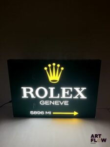 Enseigne lumineuse Rolex 35 x 50 cm Petits accidents (notamment rayures) Fonctionnelle, fournie avec alimentation