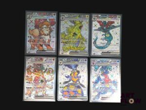 Ensemble comprenant 6 cartes Pokémon Shiny Full Art teracristal Divers blocs notamment MEGA/E&V/E&B En français Sous sleeves Etat near mint