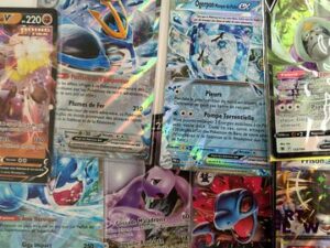 Lot d'environ 100 cartes Ultra Rares Diverses séries et raretés Contient des doubles En l'état