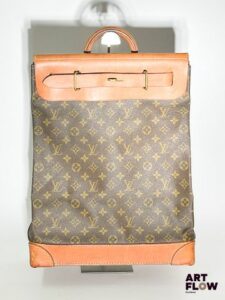 LOUIS VUITTON Modèle Steamer Grand sac en toile enduite monogrammée et cuir naturel Dim. 45 x 35 x 18 cm Avec bandoulière Usures conformes à l'âge de la pièce