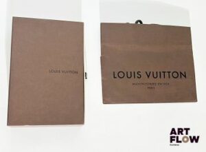 LOUIS VUITTON Portefeuille en toile monogrammée vernie bordeaux Dimensions : 19 x 10 x 2 cm Bon état, malgré le bouton-pression légèrement décoloré et des petites traces d'usure Neuf dans sa boîte