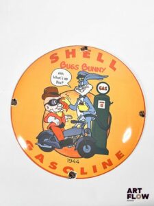 Plaque émaillée ronde bombée Shell Bugs Bunny Diamètre 30 cm env éclats et traces de rouille reproduction moderne
