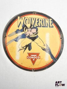 Plaque émaillée ronde Conoco - Wolverine diamètre 30 cm Petits éclats et traces de rouille Reproduction moderne