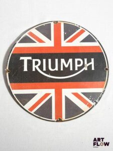 Plaque émaillée ronde Triumph diamètre 30 cm Petits éclats et traces de rouille Reproduction moderne